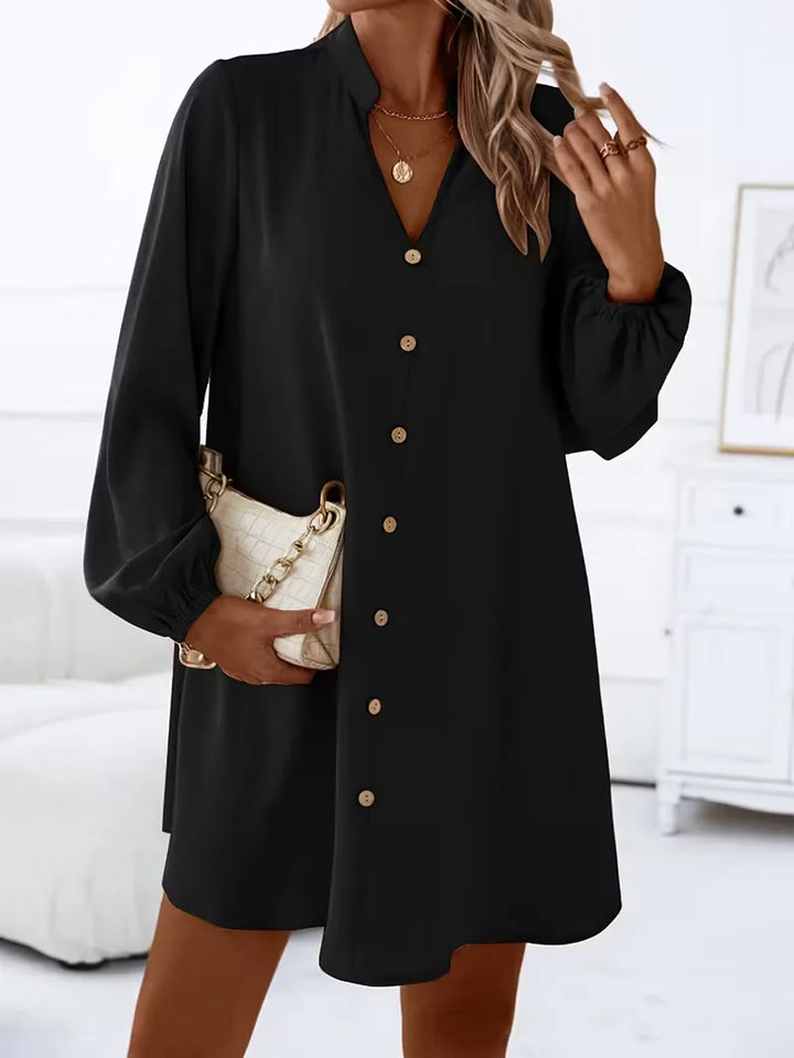 Zakelijke overhemdjurk dames, V-hals, lange mouwen. Elegante kantoorkleding, smart casual stijl.
