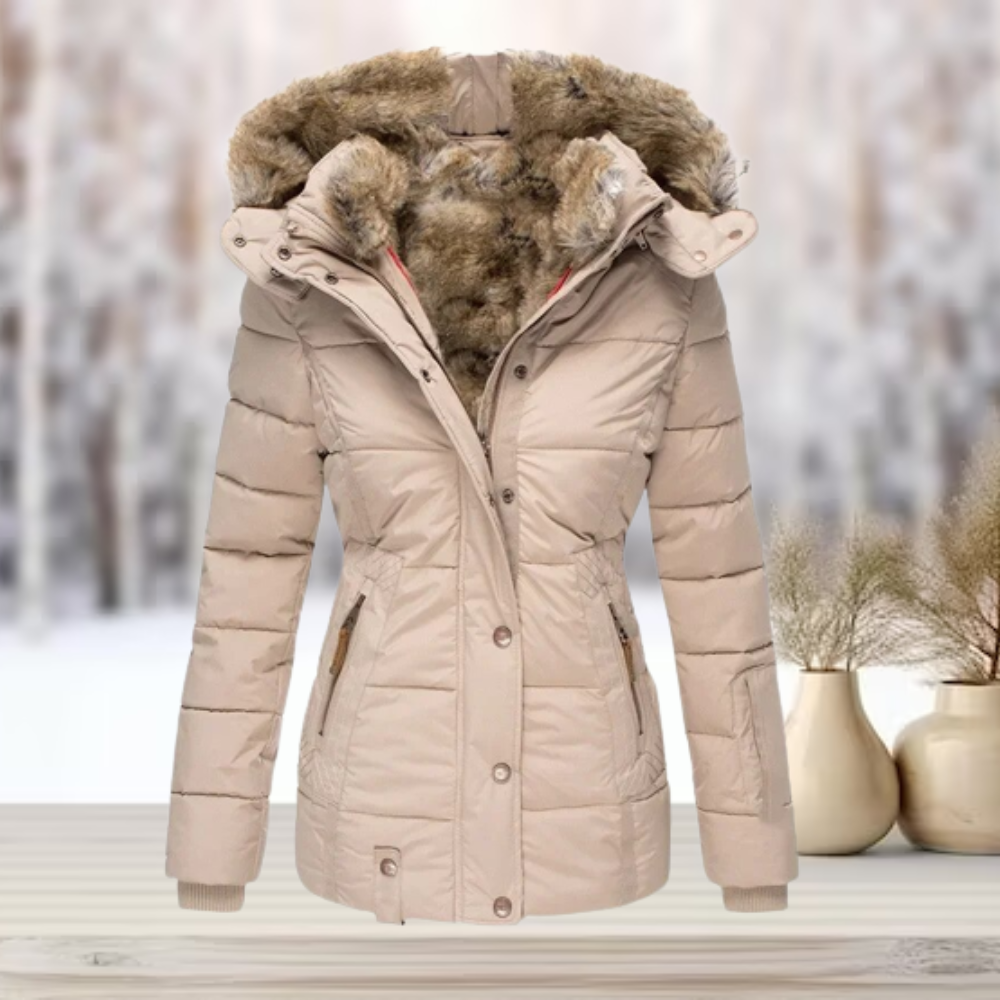 Elegante dames puffer winterjas met capuchon. Warm, stijlvol en comfortabel voor de koude wintermaanden.