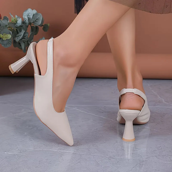 Chique puntneus damesmules met stilettohak; moderne slip-ons voor een elegante en stijlvolle uitstraling.