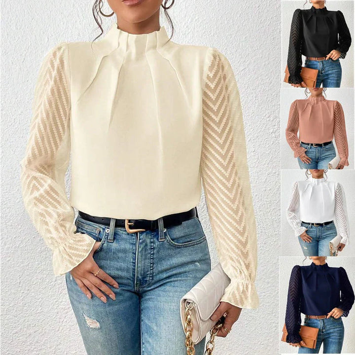Verfijnde dames top met opstaande hals, lange mouwen en elegante plooien voor een tijdloze, comfortabele stijl.