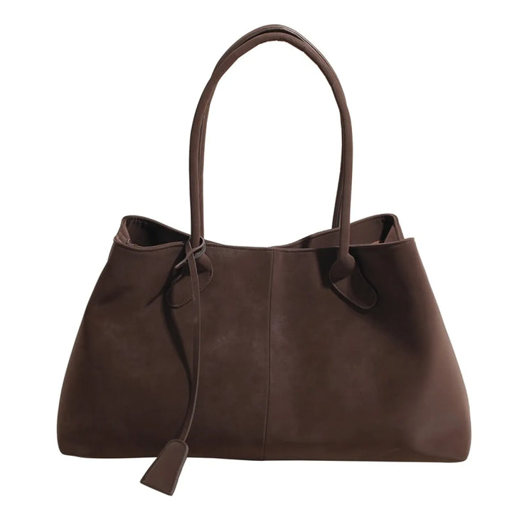 Moderne dames tote schoudertas, ruim en elegant, een stijlvolle faux leren accessoire voor dagelijks gebruik.