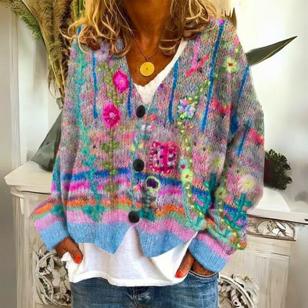 Elegante dames trui met kleurrijk bloemenmotief, perfect voor een stijlvolle en comfortabele look.