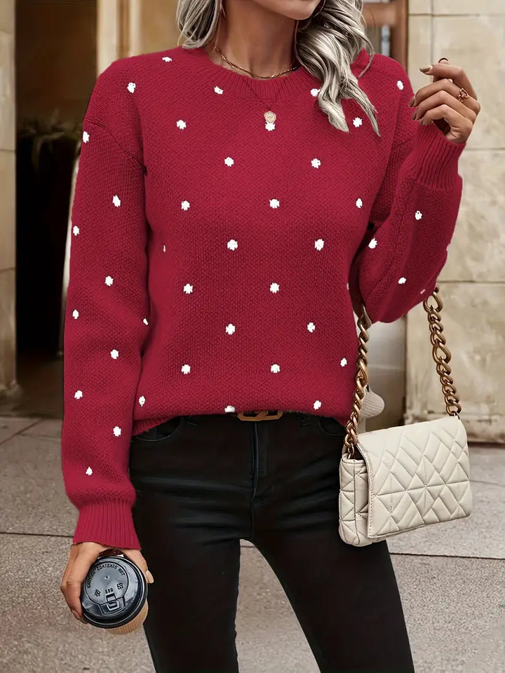 Trendy dames trui met subtiele polkadotjes en lange mouwen, geschikt voor lente en herfst.