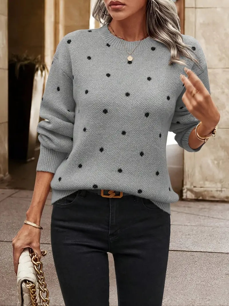 Stijlvolle zwarte polkadot dames trui met lange mouwen, veelzijdig en elegant.