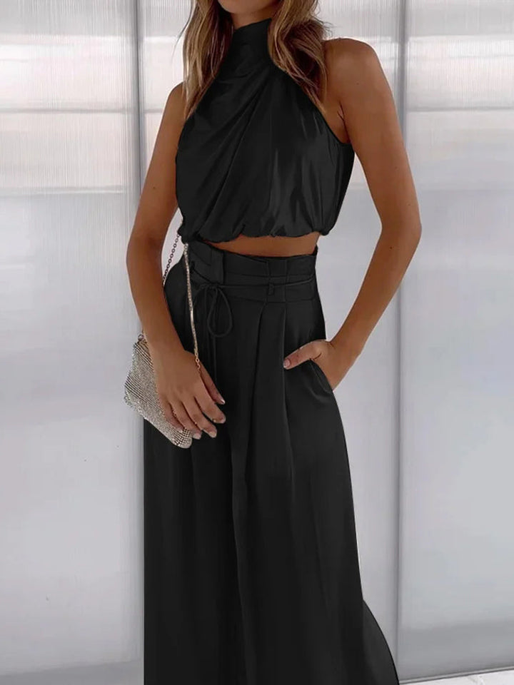 Dames co-ord set: Haltertop met één schouder en wijde broek, een veelzijdige en elegante zomerlook.