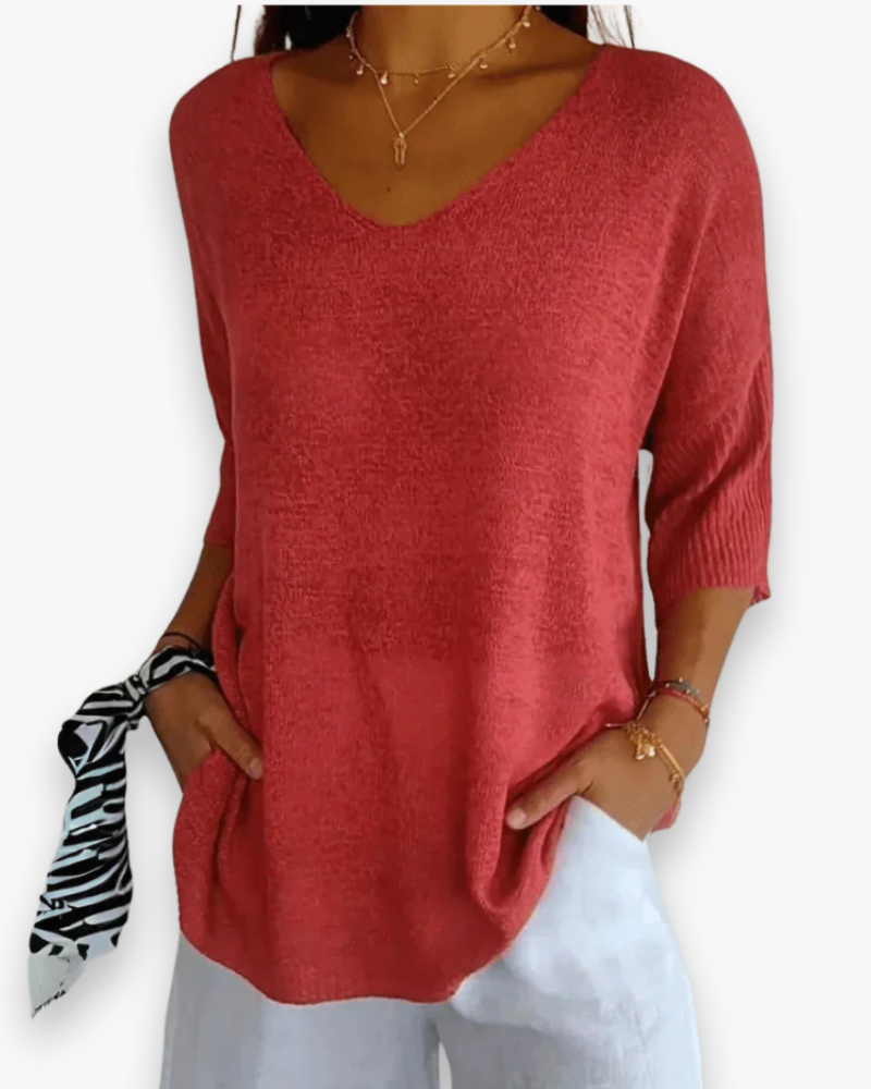 Elegante dames V-hals top met comfortabele pasvorm. Ideaal voor een modieuze en vrouwelijke zomerlook.