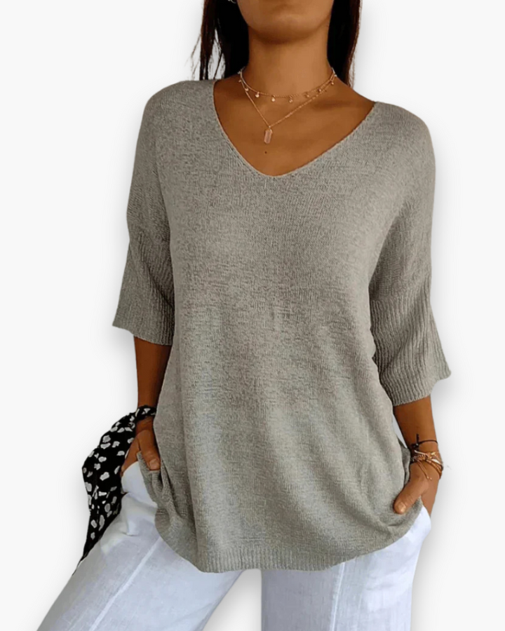 Casual elegante dames V-hals top met comfortabele, losvallende pasvorm. Ideaal als zomer top.