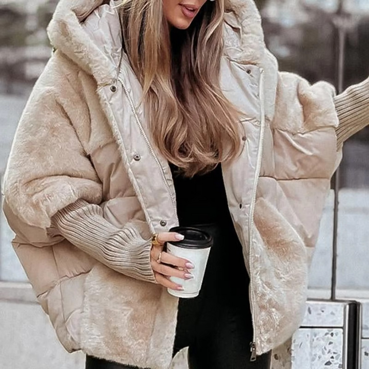 Elegante dames winterjas, warm en stijlvol. Perfecte bovenkleding voor koude herfst- en winterdagen.