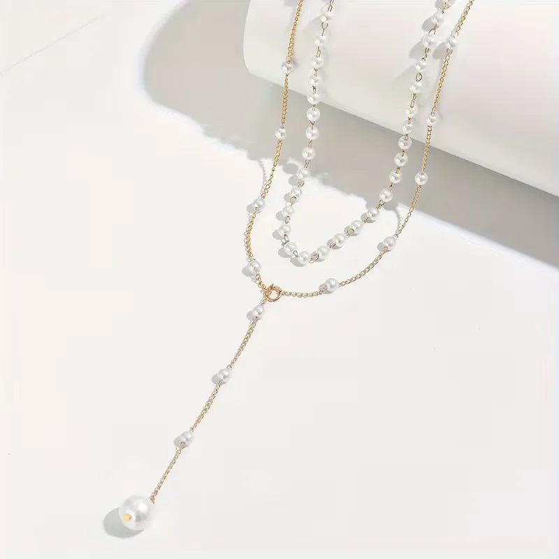 Dames Y-vormige parelketting met kwastje; stijlvol goudkleurig accessoire voor elke outfit.