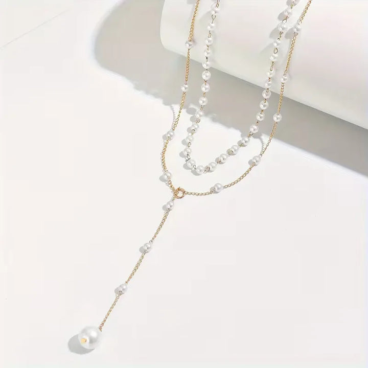 Dames Y-vormige parelketting met kwastje; stijlvol goudkleurig accessoire voor elke outfit.