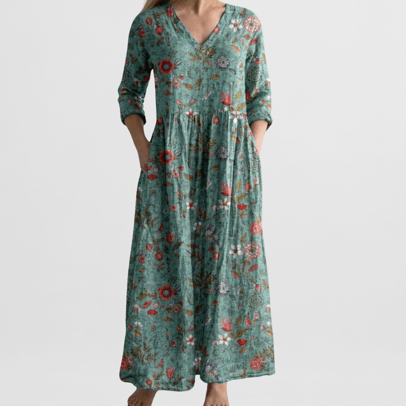 "Elegante dames zomerjurk met bloemenprint, vrouwelijke pasvorm, lichte stof, ideaal voor zonnige dagen en avondjes uit."