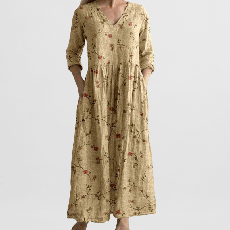 "Elegante dames zomerjurk met bloemenprint, vrouwelijke pasvorm, lichte stof, ideaal voor zonnige dagen en avondjes uit."