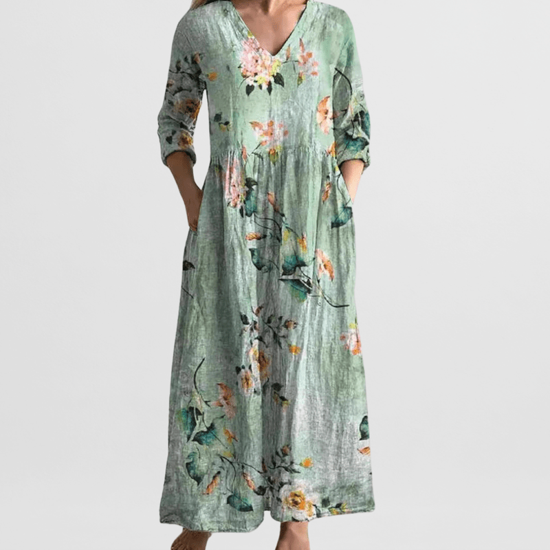 "Elegante dames zomerjurk met bloemenprint, vrouwelijke pasvorm, lichte stof, ideaal voor zonnige dagen en avondjes uit."