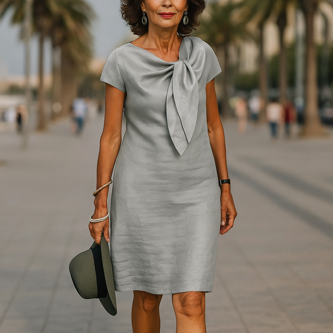 Trendy zomerjurk met lint, ideaal voor vrouwen die elegantie en comfortabele kleding waarderen.