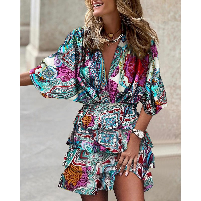 Luchtige dames midi-jurk met V-hals en wijde vleermuismouwen. Ideale casual zomerjurk die comfortabel valt.