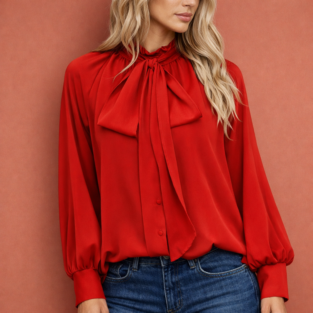 Veelzijdige strikblouse voor dames, met elegante losse pasvorm, een comfortabele en chique top voor diverse gelegenheden.