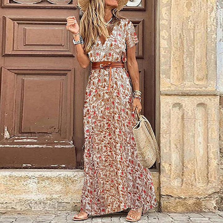 Lange dames maxi-jurk Elora met V-hals en riem, zeer comfortabel en elegant. Ideaal voor de zomer.