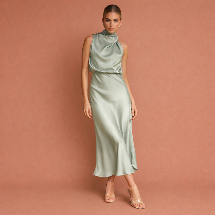 Stijlvolle dames maxi jurk met drapering, geschikt voor zomerse feesten of herfst avondjes, elegante speciale gelegenheid jurk.