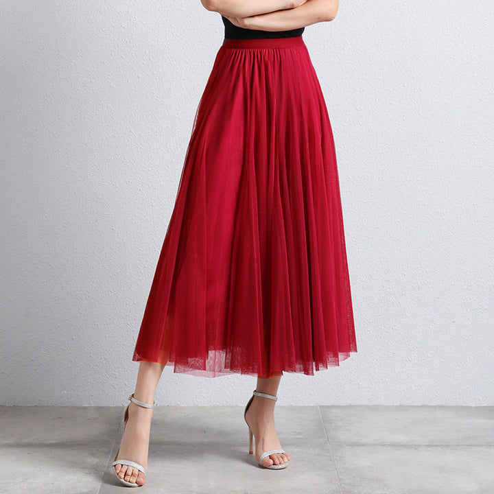 Elegante gelaagde dames maxi rok, A-lijn pasvorm. Creëert een slank silhouet en is zeer modieus.