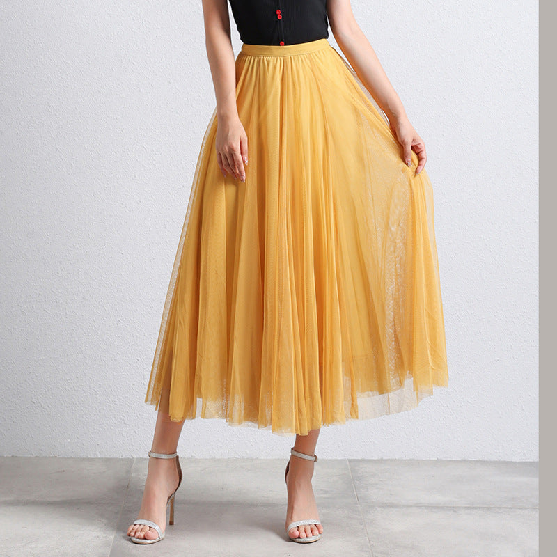Feestelijke veelkleurige dames maxi rok, gelaagd en comfortabel met elastische taille. Ideaal voor evenementen.