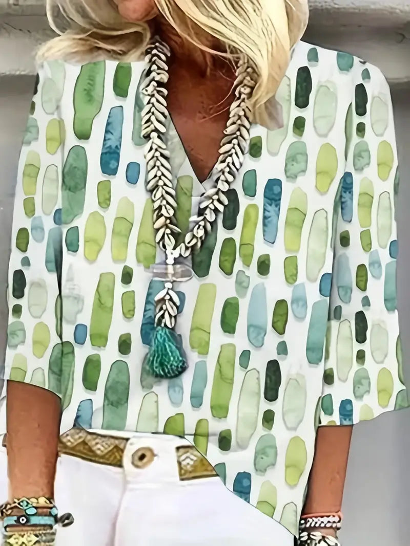 "Elegante geometrische blouse met V-hals, 3-kwart mouwen; moderne print, veelzijdig voor elke gelegenheid."