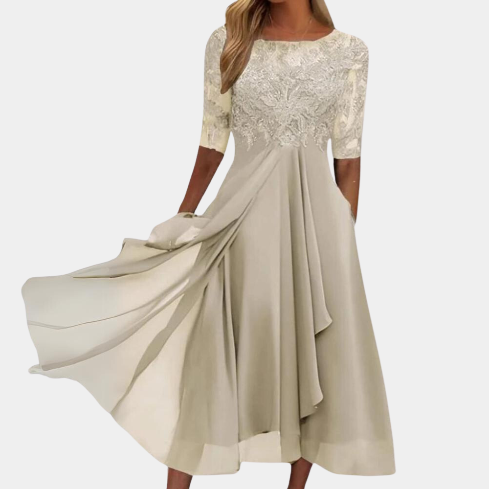 Chique damesjurk met verfijnde kanten details, een modieuze avondlook.
