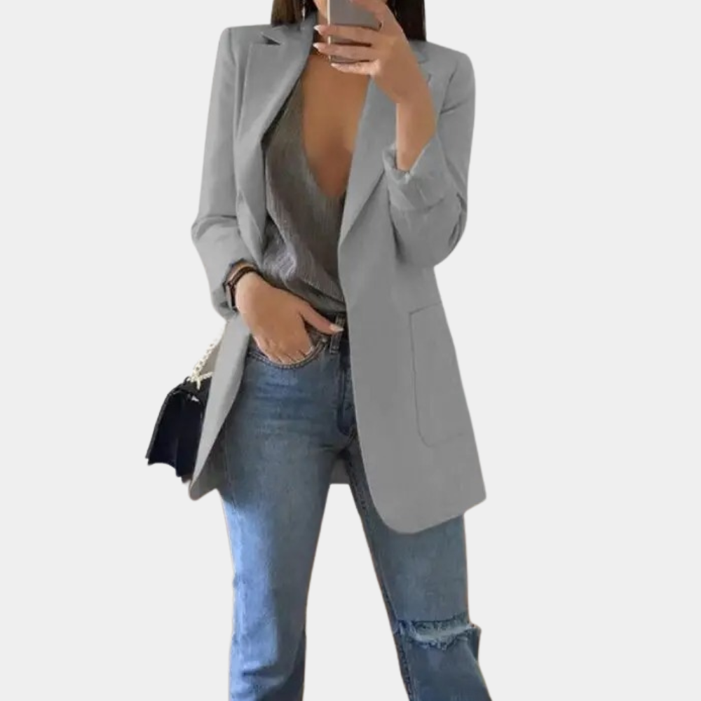 Lange, stijlvolle damesblazer, perfect als zakelijke of casual toevoeging aan je outfit.