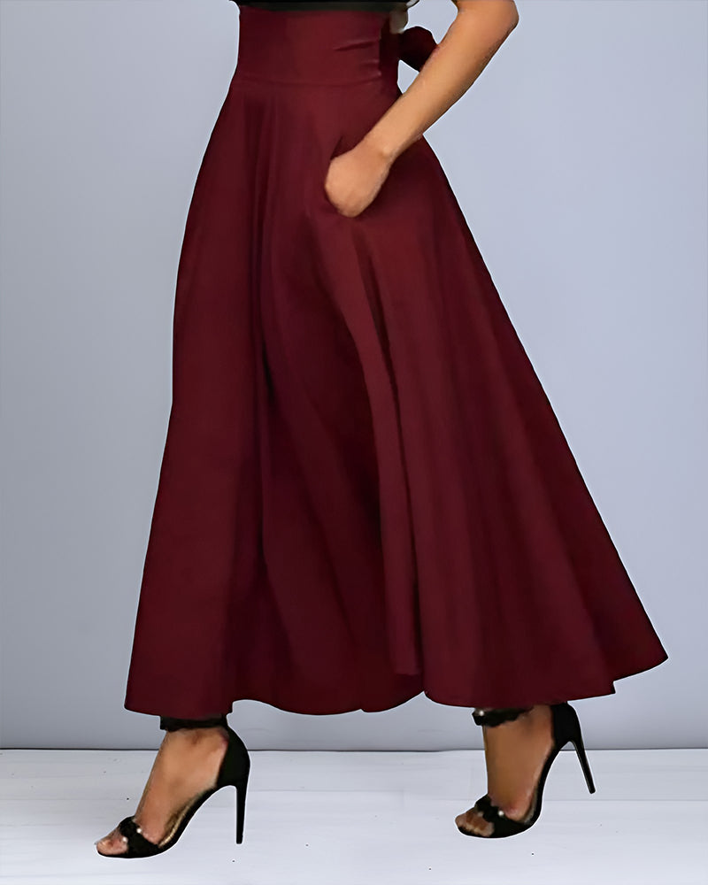 Chique damesrok met hoge taille en lange pasvorm; een veelzijdige, modieuze keuze voor zomer en feestelijke kleding.