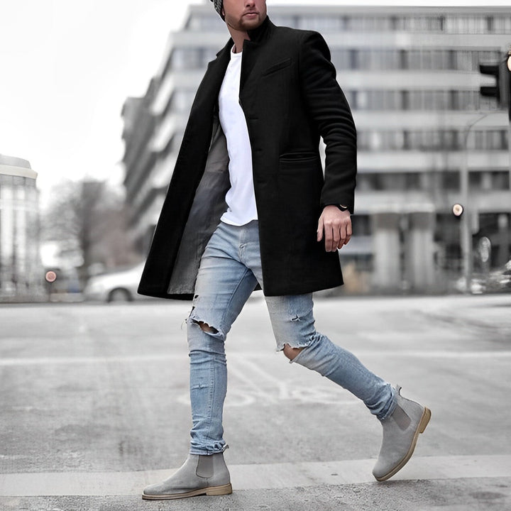 Warme lange heren overjas, perfect als winterjas. Klassieke snit met knoopsluiting voor comfort en stijl.