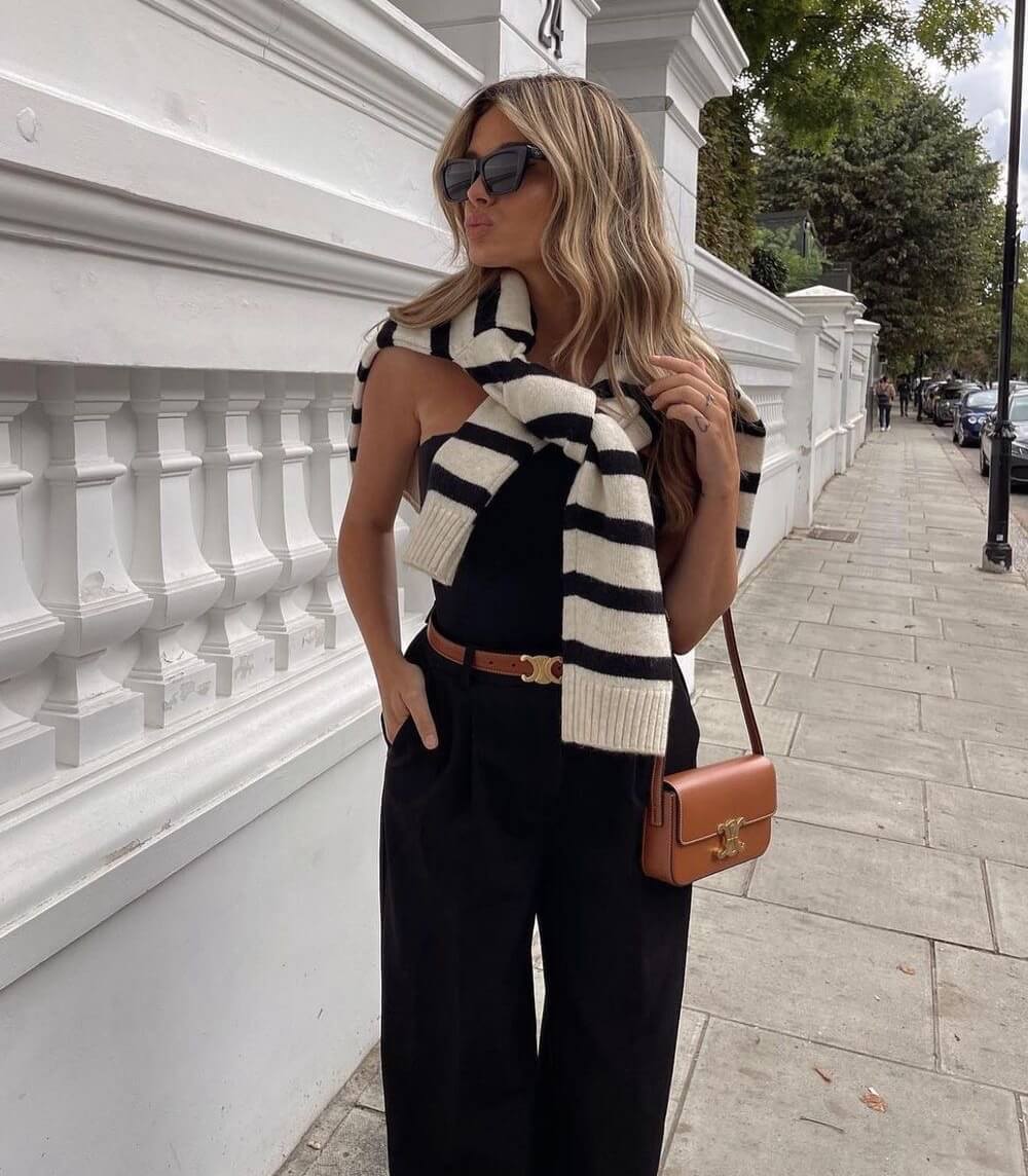 "Elegante lederen damesriem met luxe gouden gesp, in bruin leer, ideaal voor elke outfit."