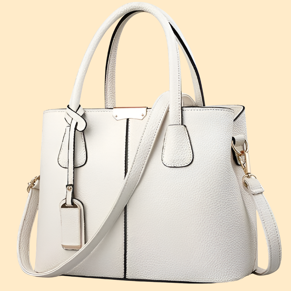 "Elegante leren schoudertas voor dames met tijdloos effen ontwerp en praktische buitenzak, ideaal voor elke gelegenheid."