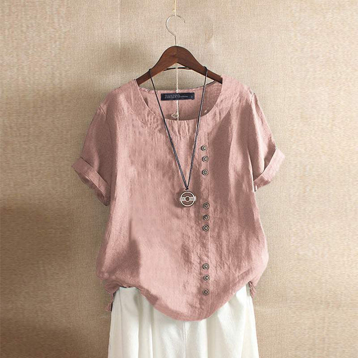 Blouse dames roze, korte mouw, knoopsluiting, elegante uitstraling.