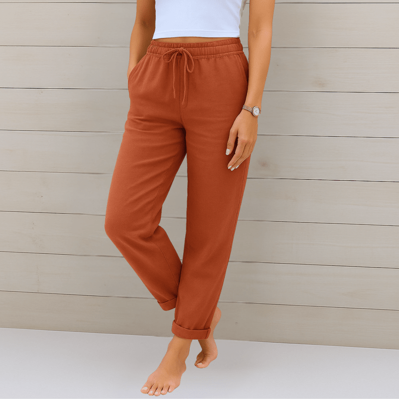 Elegante damesbroek van linnen, beige, ademend, comfortabele pasvorm voor dagelijks gebruik. Zichtbaar: simpele ritssluiting.