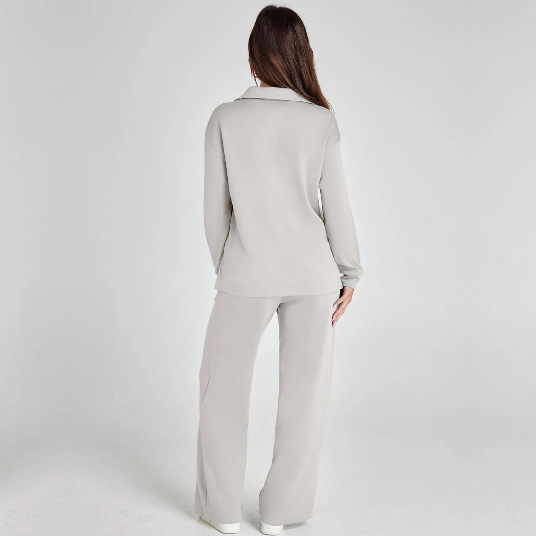 "Elegante loungewear set voor dames met off-shoulder sweater en perfect passende broek, trendy en comfortabel zichtbaar."