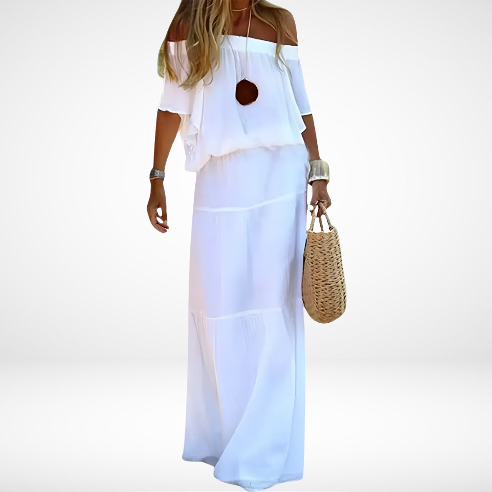 "Elegante maxi strandjurk in boho stijl, off-shoulder met V-hals en vetersluiting, luchtige chiffonstof."