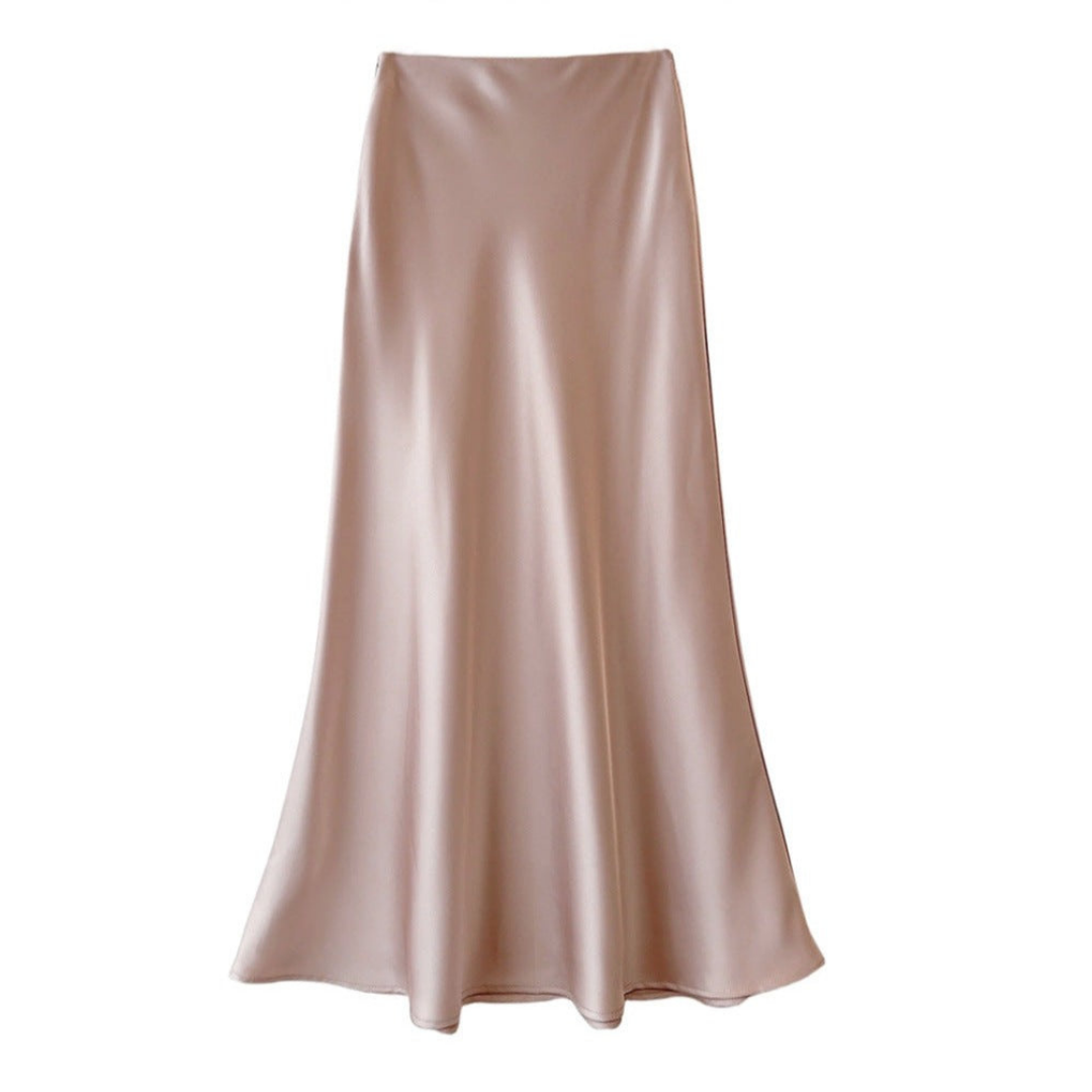 Veelzijdige elegante midi rok dames, met vloeiende pasvorm en subtiele glans. Comfortabel voor een stijlvolle look.