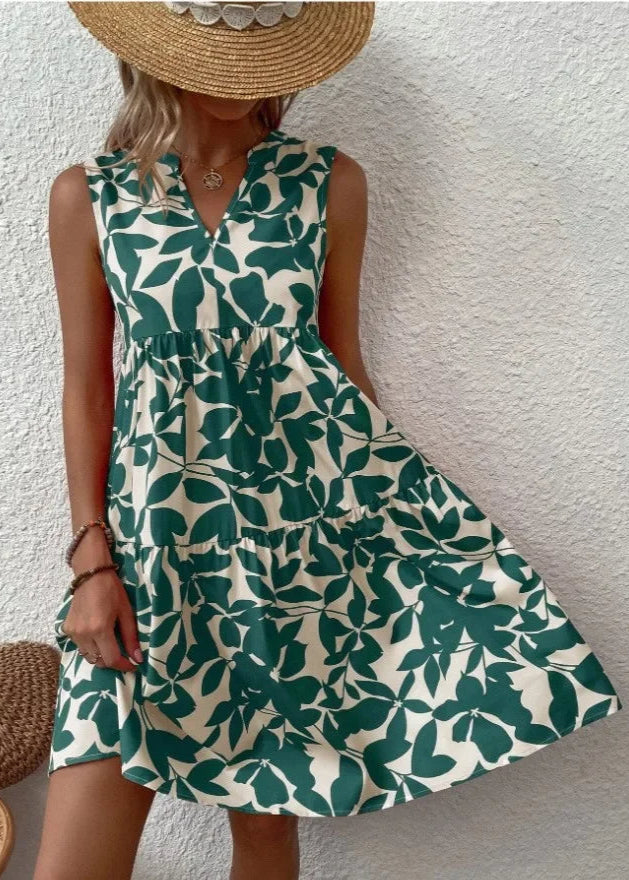 Elegante midi-jurk met V-hals, zomerse bloemenprint, luchtige stof, mouwloos, ideaal voor warme dagen en stijlvolle uitstrali