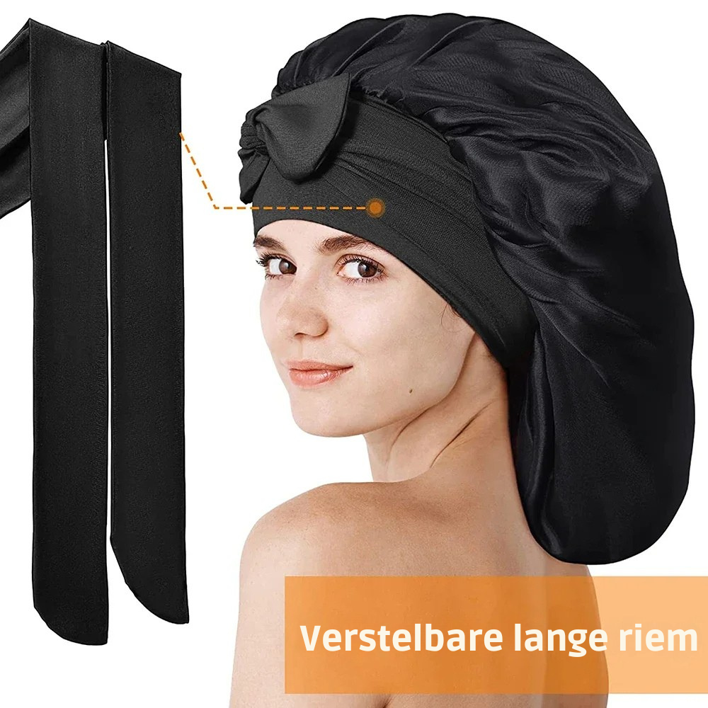 "Elegante moerbeizijden slaapmuts voor vrouwen met verstelbare band, close-up op luxe materiaal en satijnen afwerking."