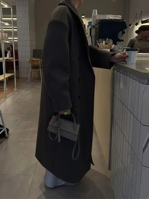 "Elegante Noëlle oversized jas voor dames, lichtgewicht en trendy voor lente, double-breasted, met split voor comfort."