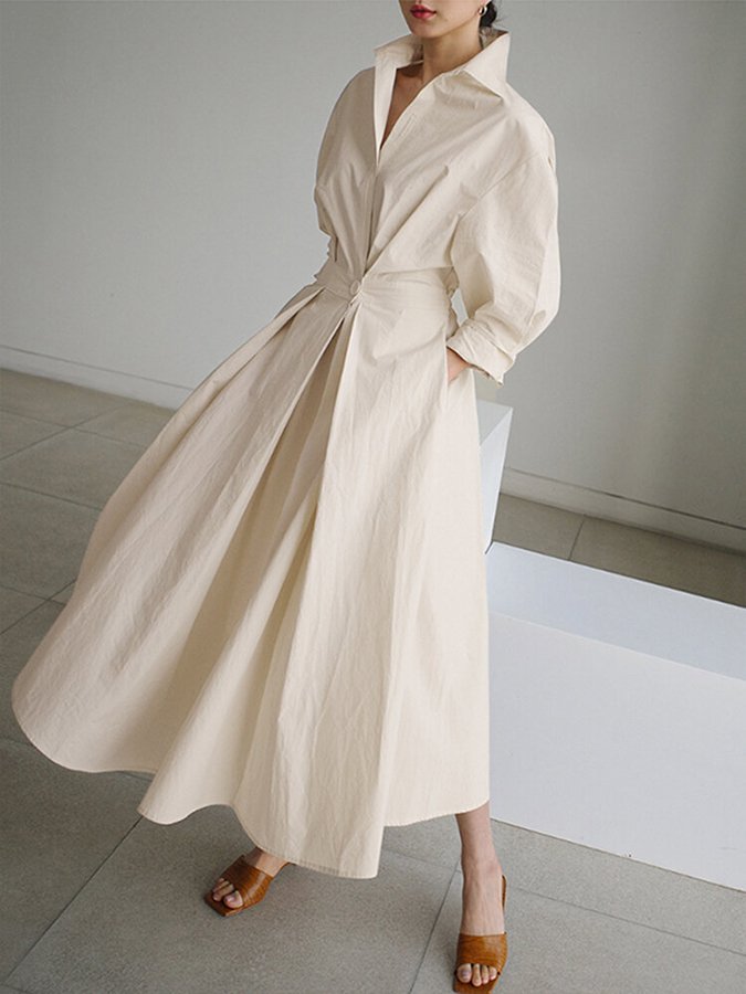 Beige retro dames midi jurk met lange mouwen. Tijdloos elegante en comfortabele jurk voor zomer of feestelijke gelegenheden.