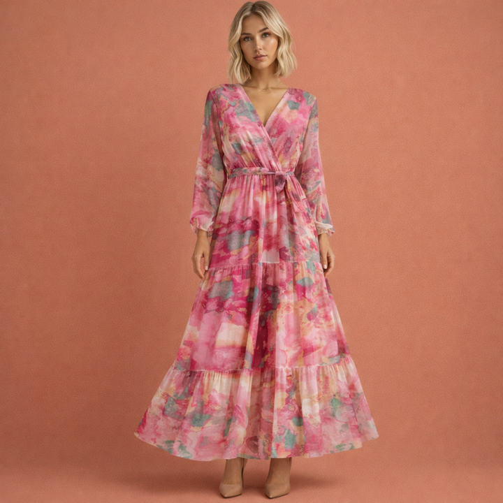 Elegante roze dames maxi jurk met flatterende V-hals en stijlvolle ceintuur, perfect voor zomer of feest.