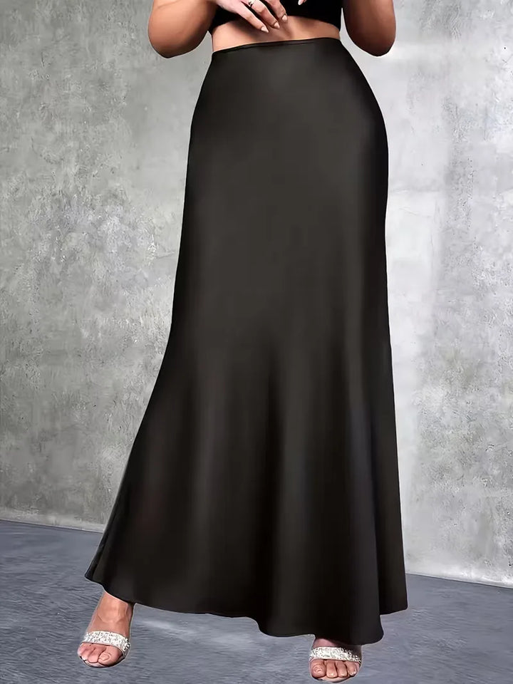 Vloeiende dames satijnen rok, hoge taille, maxi lengte, perfect voor een gracieuze look.
