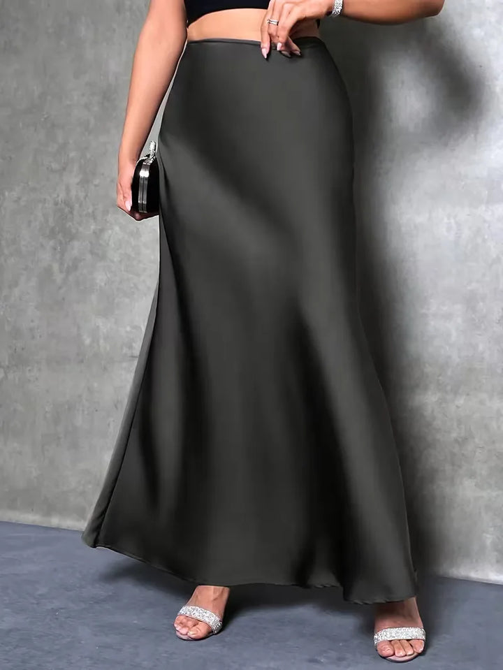 Sierlijke satijnen damesrok, hoge taille, maxi lengte, straalt pure elegantie uit.