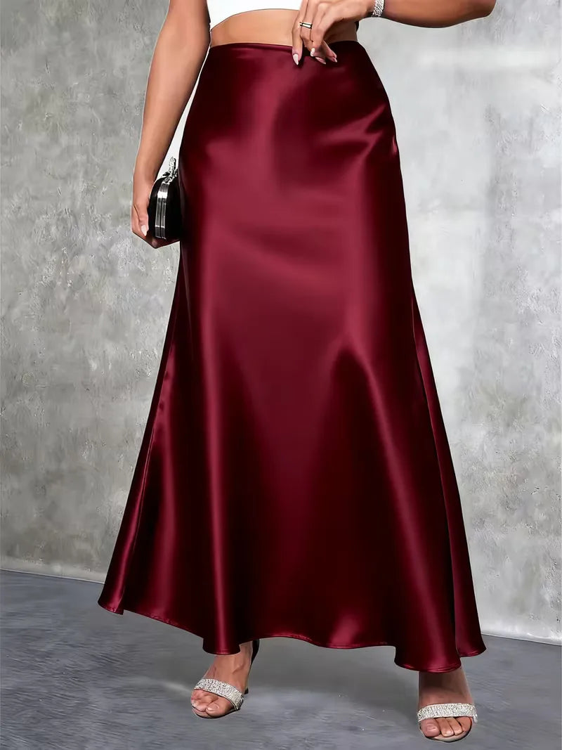 Modieuze damesrok: satijnen maxi rok met hoge taille, perfect voor herfst- en wintermode.