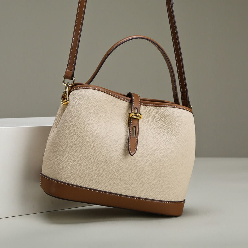 Stijlvolle gestructureerde dames schoudertas van tweekleurig kunstleer, elegante handtas ideaal voor werk of vrije tijd.