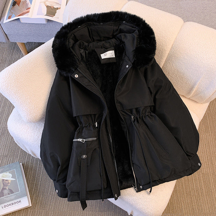 Kaki dames winterparka, stijlvolle en warme jas voor een trendy winterlook.