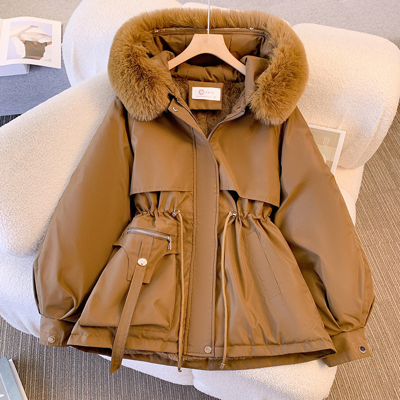 Zwarte dames winterjas, een warme en modieuze parka, ideaal voor de koude winter.