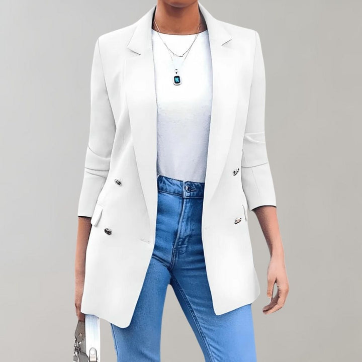 Veelzijdige dames blazer in wit, marineblauw of roze. Comfortabel en modieus voor elke gelegenheid.