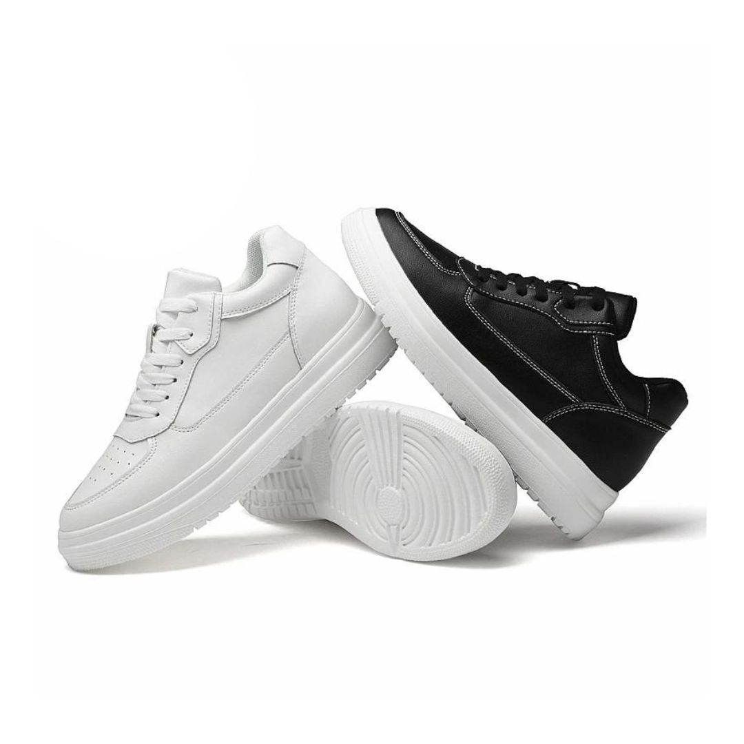 Modieuze verhoogde heren sneakers in zwart, combineren streetwear stijl met subtiele lengtewinst.