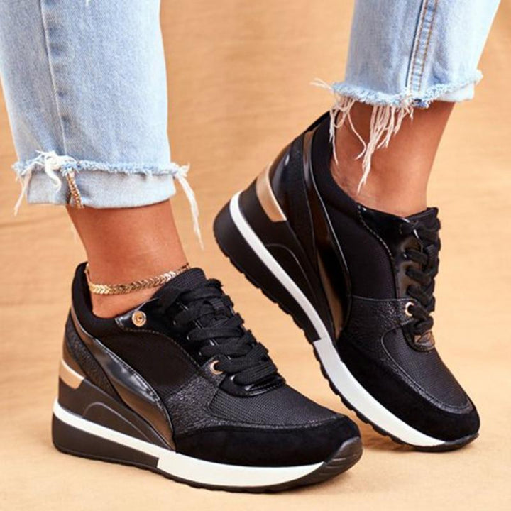 Zwarte dames veterschoenen met ergonomische comfortsamenstelling, voor optimale voetondersteuning.